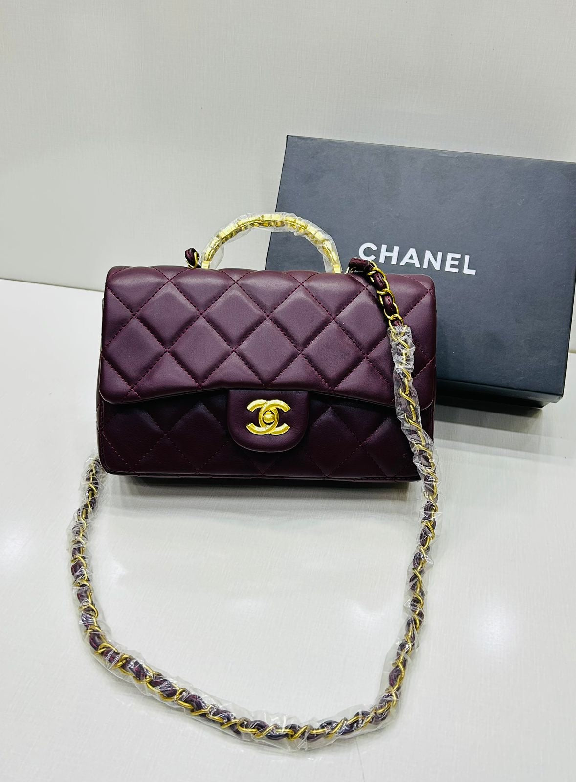 Channel Top Handle Bag