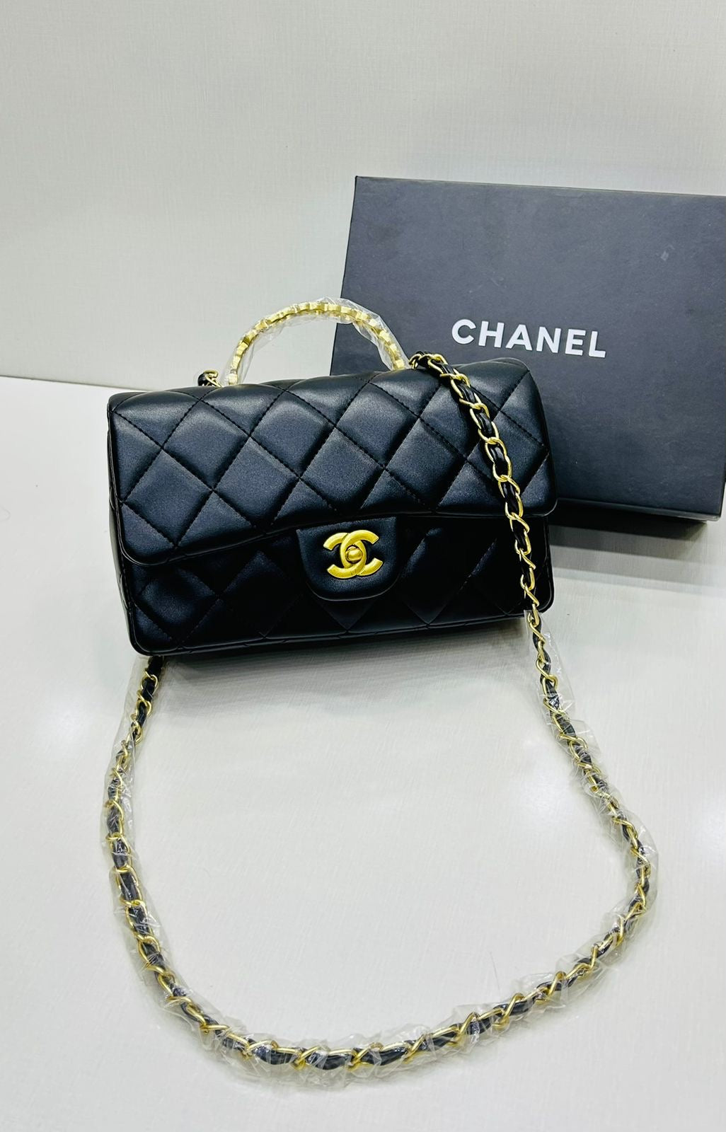 Channel Top Handle Bag